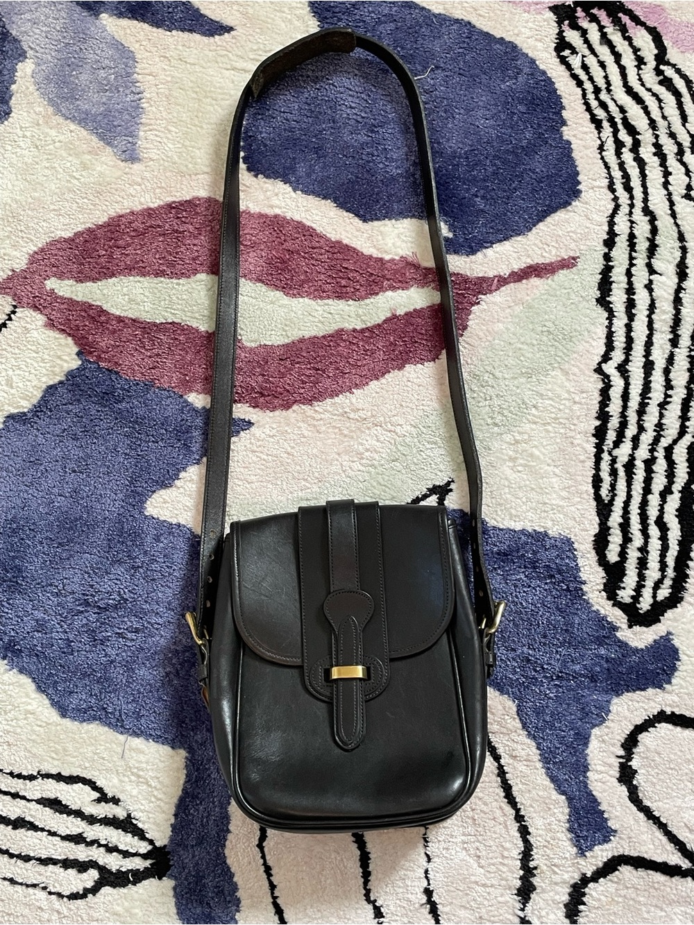 Dooney & Bourke vintage black leather crossbody bag solid brass medallion 1980s?